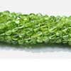Natural Green Peridot Smooth Coin Beads Strand Length 14 Inches and Size 4mm approx. 
